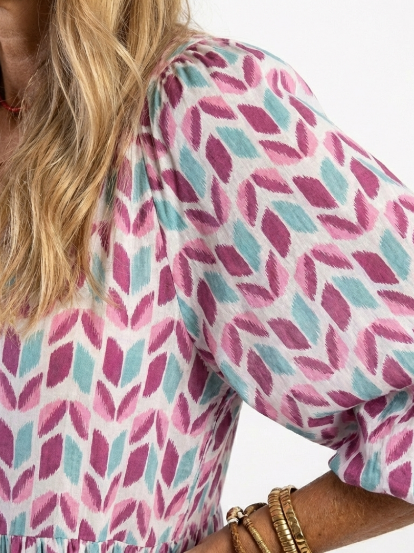 Calen | Geometric Print Long Sleeve Tiered Midi Dress